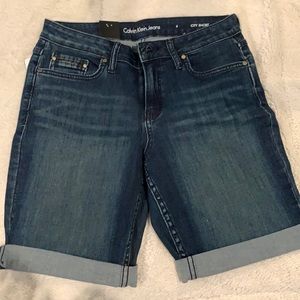 Calvin Klein Jeans denim shorts. BNWT. Size 6. Dark blue wash (inkwell)